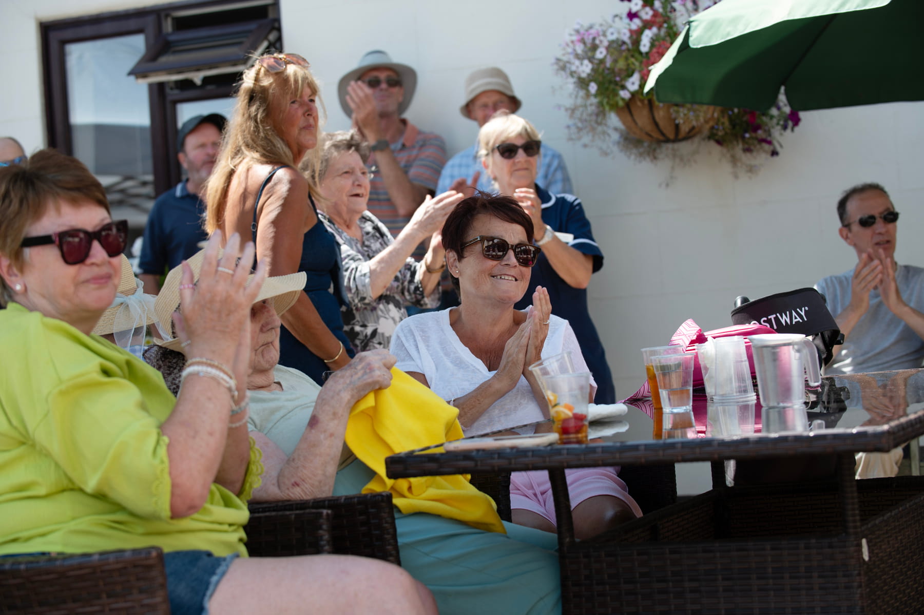 Residents and guests spending time together at Hollymead House