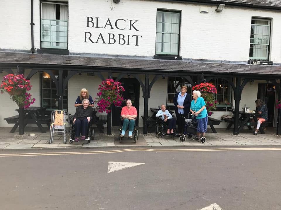 Residents enjoying activities at Hollymead House
